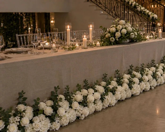 White floral garland along a banquet table